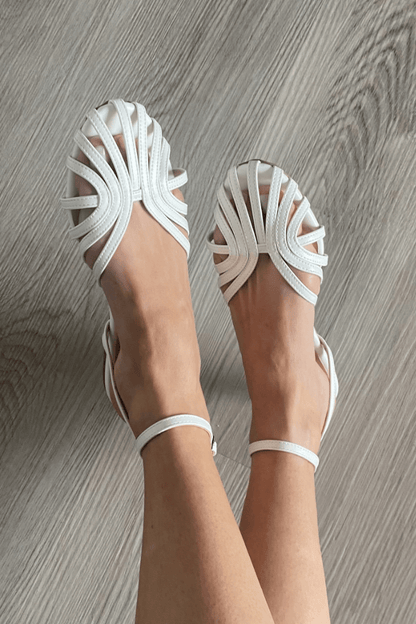 SOLE | Elegant woven flat sandals for a sophisticated look