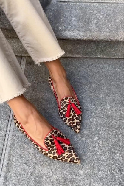 SAVINA | Elegant pointed loafers with fringe details for a refined look