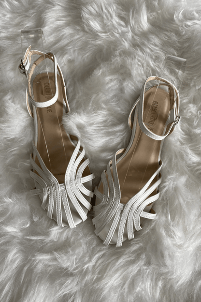 SOLE | Elegant woven flat sandals for a sophisticated look