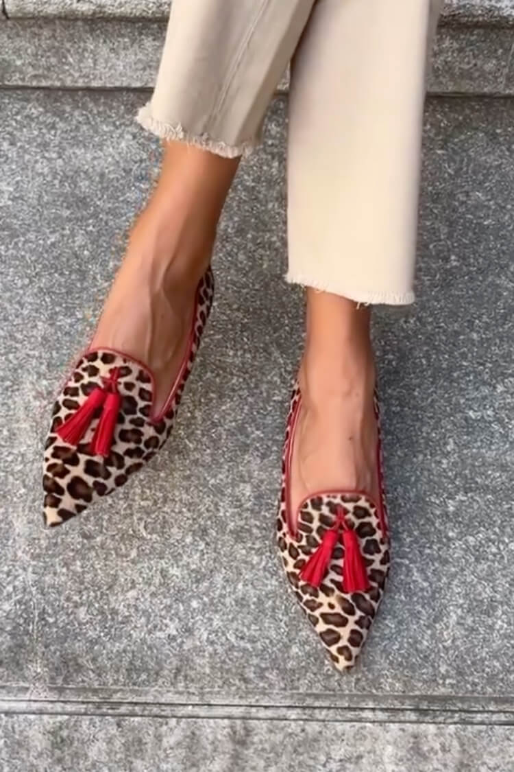 SAVINA | Elegant pointed loafers with fringe details for a refined look